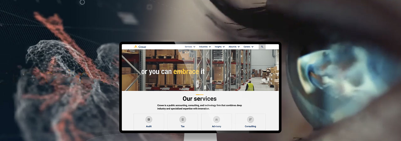 Desktop monitor displaying Crowe services webpage