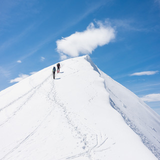 Two climbers on a snowy mountain