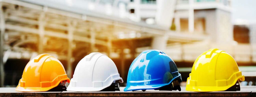 colorful hardhats in a row