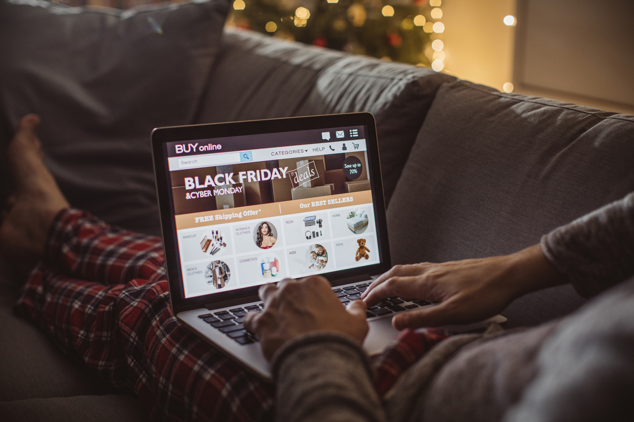 Person viewing Black Friday deals on a laptop.