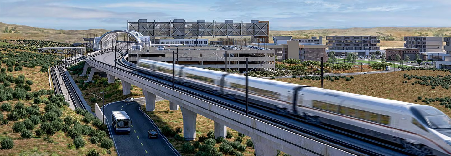 Autodesk render of a railway with buildings in background.